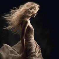 hot and beautiful woman wearing a long dress on black background photo