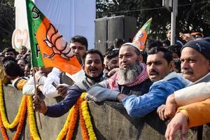 New Delhi, India - January 16 2023 - Thousands of people collected during Prime Minister Narendra Modi BJP road show, people during PM Modi big election rally in the capital photo