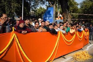 New Delhi, India - January 16 2023 - Thousands of people collected during Prime Minister Narendra Modi BJP road show, people during PM Modi big election rally in the capital photo