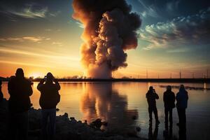 A group of people watch a rocket launch into space on the horizon, . photo