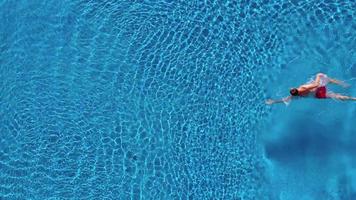 Topview from a drone over the surface of the pool video