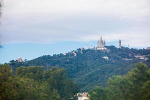 View of the Tibidabo mountain in Barcelona city in Spain photo