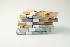 Jakarta, Indonesia, April 15, 2023, various bundles of Indonesian rupiah banknotes in the IDR currency thousands copy space thr zakat photo