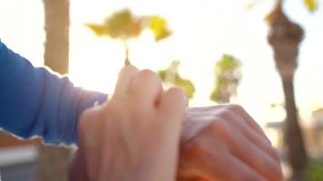 Smartwatch. Woman using smart watch. Closeup of female touching touch screen on watch entering watch app video