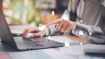 accountant auditing documents ,quality assessment management With checklist ,business document evaluation process , business account checking ,plan review process ,cost analysis ,financial paperwork photo
