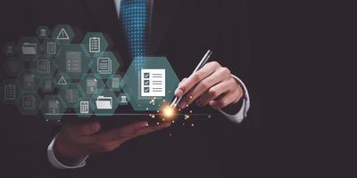 checkbox to conduct opinion and quality surveys or satisfaction , quality inspection ,Qualification for Measurement ,accountant auditing documents ,quality assessment management With a checklist photo