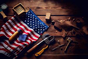 Happy Labor day concept. American flag with different construction tools. photo