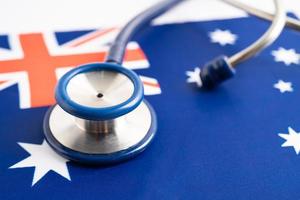 Stethoscope on Australia flag background, Business and finance concept. photo