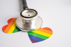 LGBT rainbow colorful flag heart and ribbon, symbol of lesbian, gay, bisexual, transgender, human rights, tolerance and peace. photo