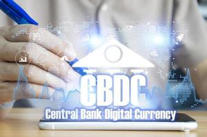 A CBDC is a digital currency issued by a central bank. which has the ability to act as a medium to pay for goods and services can maintain value and is an accounting unit of measurement photo