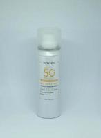 Jakarta, Indonesia - April 21th, 2023 - Skintific sun screen spray spf 50 solar uv block product object photography isolated on plain white landscape horizontal background. photo