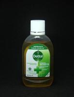 Jakarta, Indonesia - April 21th, 2023 - Dettol antiseptic and antibacterial liquid medical product photography isolated on plain black background photo