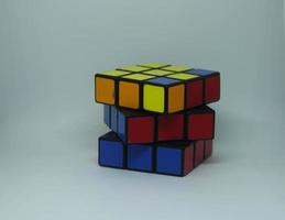 Jakarta, Indonesia - April 21th, 2023 - Rubick or rubik puzzle game product object photography isolated on plain white landscape horizontal background. photo