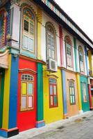 Singapore little india 22 june 2022. street view of Colorful facade buildings and traffic photo
