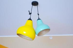 colorful ceiling lamp hanging in a room , photo