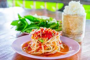 green papaya salad with sticky rice photo