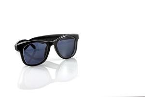 Black sunglasses on white background photo