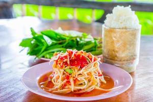 green papaya salad with sticky rice photo