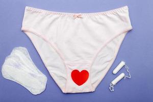 women's briefs with tampons and panty liners . hygiene and women's health care concept photo