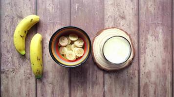 morning breakfast banana and milk on table video