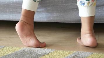 low angle view of A child walking on tiptoes video