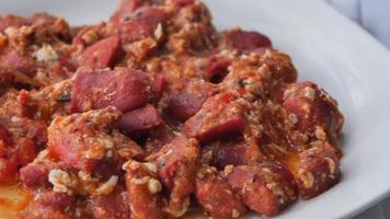 tomato Scrambled eggs and sausage in a bowl video