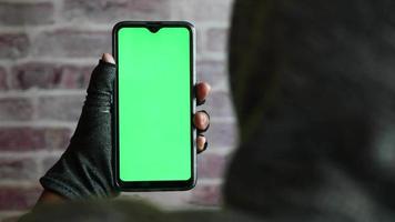 hacker hand stealing data from smart phone . video