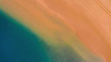 Aerial view of the golden sand of the beach Las Teresitas and colorful boats, Tenerife, Canaries, Spain video