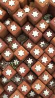 Red clay Memorial stones at Westerbork with Star of David video