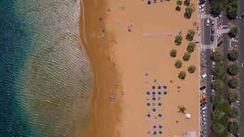 Top view of Las Teresitas beach, road, cars in the parking lot, golden sand beach, Atlantic Ocean. Paradise day at the beach. Tenerife, Canary Islands, Spain video