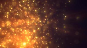 abstrato amarelo ouro energia partículas e pontos brilhando vôo faíscas festivo com bokeh efeito e borrão fundo, 4k vídeo, 60. fps video