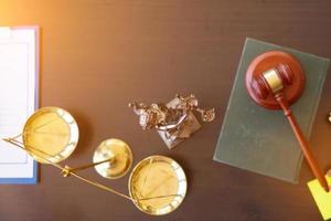 wooden judge gavel on table as symbol of justice for use in legal cases judicial system and civil rights and social justice concept with judge. concept of legislation to judge lawsuits with justice. photo