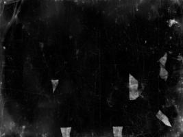 Vintage Black Scratched Texture with Old Film Effect - Abstract Grunge Background for Design and Art - Retro Aged Monochrome Backdrop photo