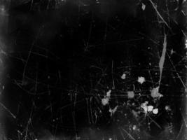 Vintage Black Scratched Texture with Old Film Effect - Abstract Grunge Background for Design and Art - Retro Aged Monochrome Backdrop photo