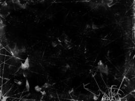 Vintage Black Scratched Texture with Old Film Effect - Abstract Grunge Background for Design and Art - Retro Aged Monochrome Backdrop photo