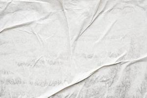 White blank crumpled and creased paper poster texture background photo