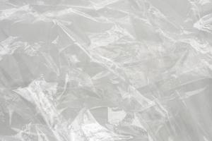 transparent plastic bag texture on white background photo