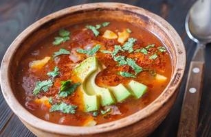 Bowl of spicy Mexican soup photo