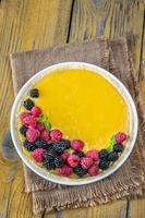 Lemon curd tart with fresh berries photo