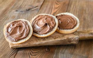 Slices of bread with chocolate paste photo