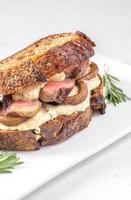 Sandwich with beef steak and mushrooms photo