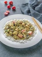 Thai green chicken curry with rice photo