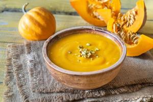 Bowl of pumpkin soup photo