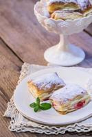 Mille-feuille with fresh cherry photo