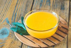 Glass bowl of lemon curd photo