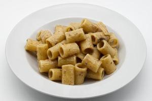 Italian Macaroni pasta with porcini mushroom sauce. photo