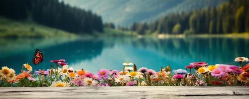 empty wooden table decorated with colorful flowers. Blurred lake and mountain view background. copy space. For product displays. templates, media, printing, etc., generate ai photo