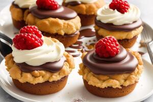 Delicious Chocolate cake with cream and icing sugar on a white plate. Eclairs with chocolate cream and cherry, photo