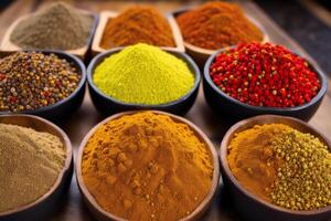 Spices and herbs in wooden bowls. Food and cuisine ingredients. photo