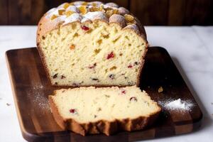 Christmas cake with raisins and powdered sugar. Panettone cake with raisins and icing sugar. photo